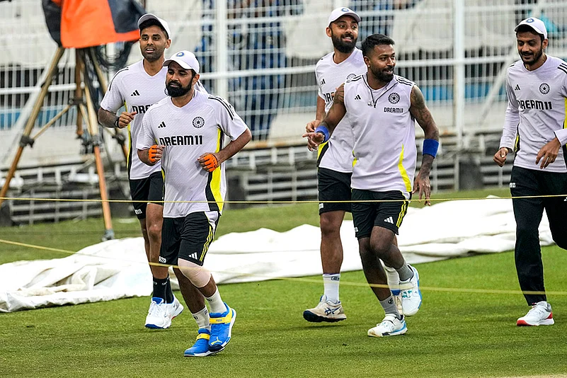 India vs England T20 Cricket series Indian team practice session photos: Varun Chakravarthy