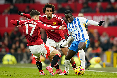 EPL 2024-25: Brighton's Yankuba Minteh fights for the ball with Man United's Alejandro Garnacho