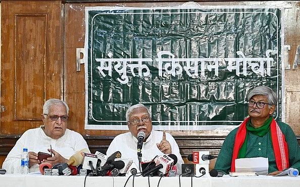 Hannan Mollah with Sunilam addressing media personnel at Press Club of India in July 2024