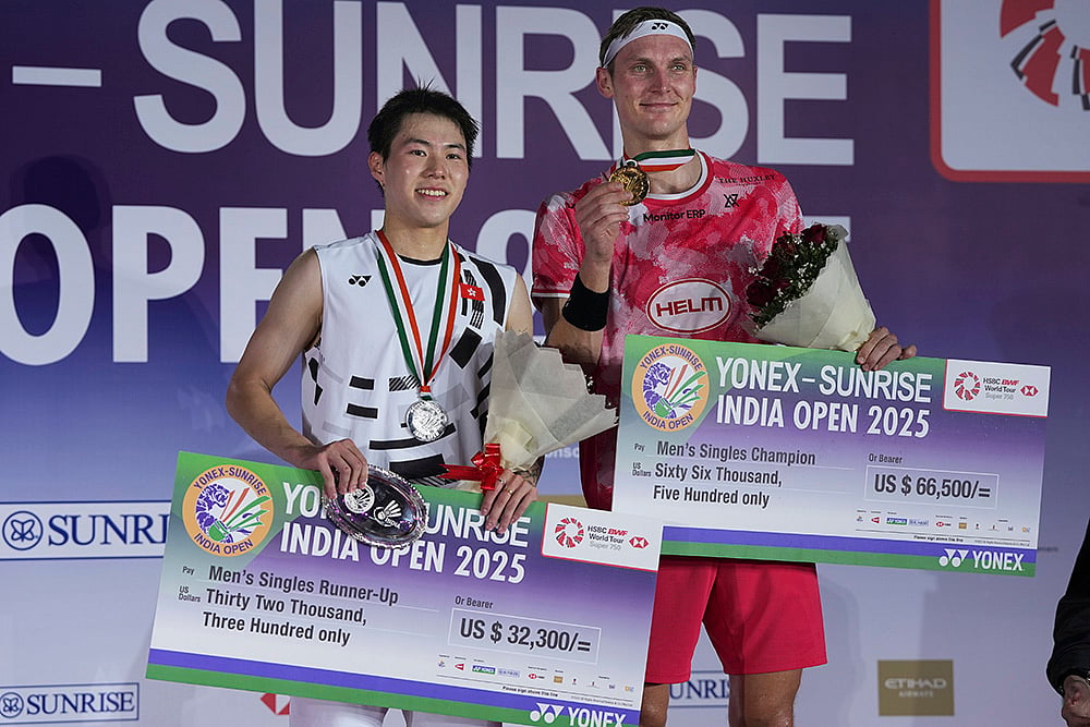 India Open 2025 badminton tournament Viktor Axelsen with Lee Cheuk Yiu