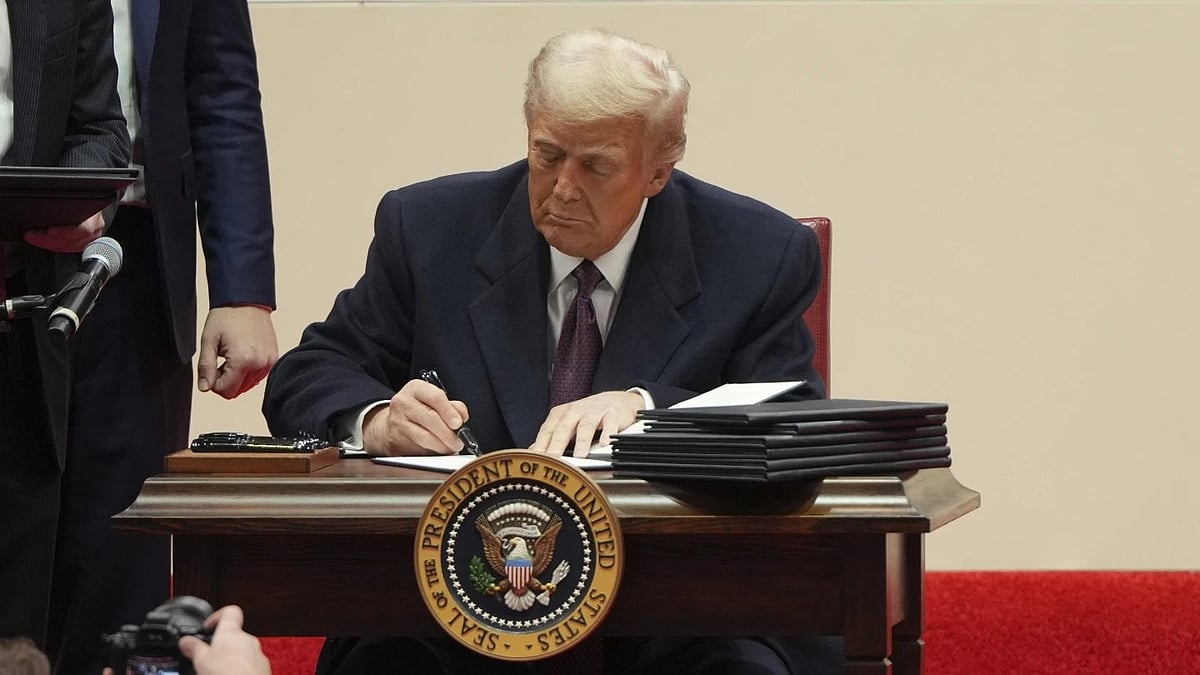 | AP : US President Donald Trump signing executive orders at the White House on Monday