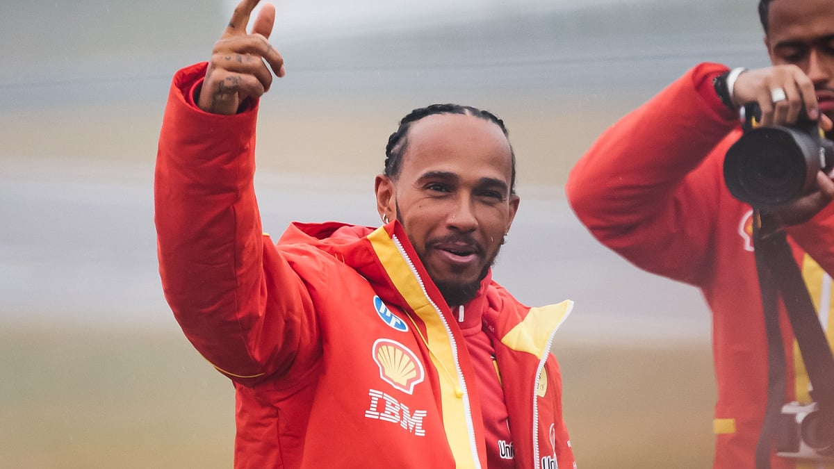 Lewis Hamilton in Ferrari red on Wednesday