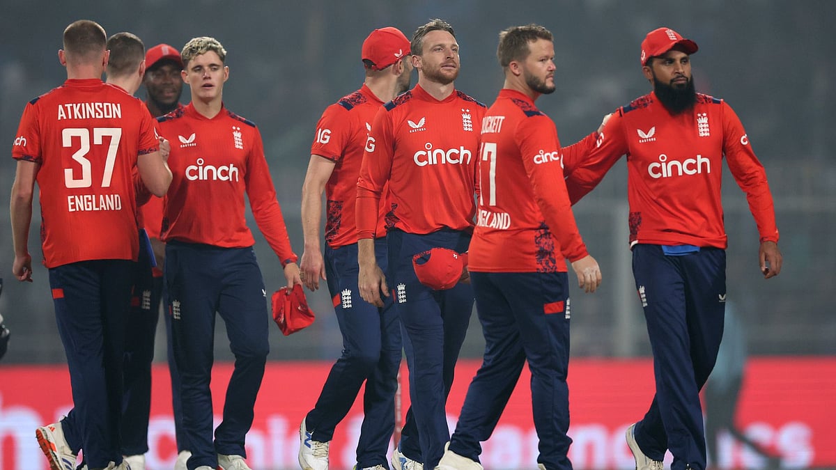 Buttler and his team-mates look on during the first T20I