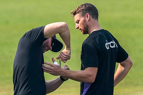 IND vs ENG 1st T20: England's team support staff puts adhesive tapes on the fingers of Jos Buttler