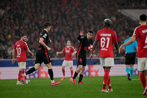 Champions League 2024–25: Pedri holds the ball as they restore the game after a goal by Raphinha