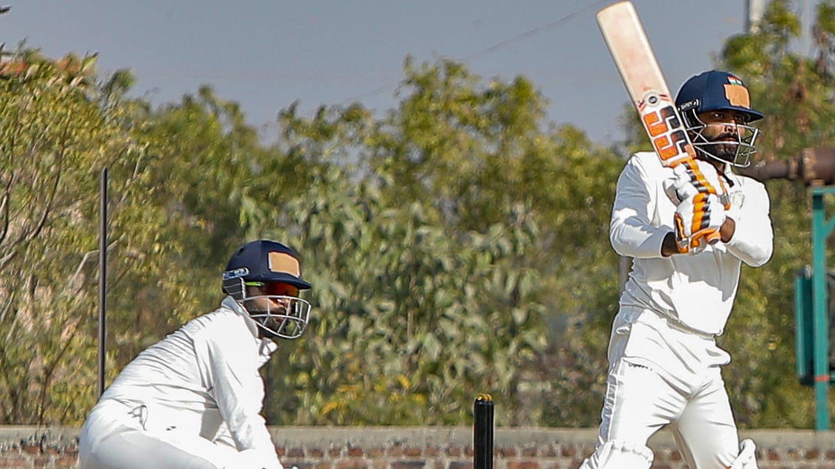 PTI : Saurashtra's Ravindra Jadeja plays a shot during the first day of Ranji Trophy cricket match between Saurashtra and Delhi, at Niranjan Shah Stadium, in Rajkot, Gujarat, Thursday, Jan. 23, 2025.