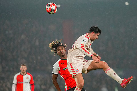 Champions League 2024-25: Bayern's Aleksandar Pavlovic, right duels for the ball with Feyenoord's Chris-Kevin Nadje