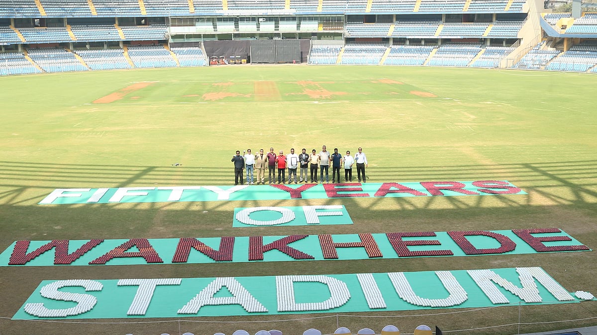 Special Arrangement : MCA officials pose with the Guiness World Record title at the Wankhede Stadium.