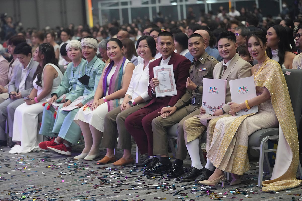 Couples from the LGBTQ+ community show their marriage certificates after the Marriage Equality Act took effect in Bangkok, Thailand, Thursday, Jan. 23, 2025.  - AP Photo/Sakchai Lalit