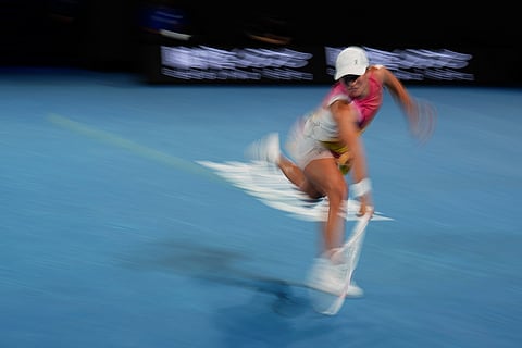 AUS Open 2025 Women's Singles Semi-final: Iga Swiatek plays a backhand return to Madison Keys