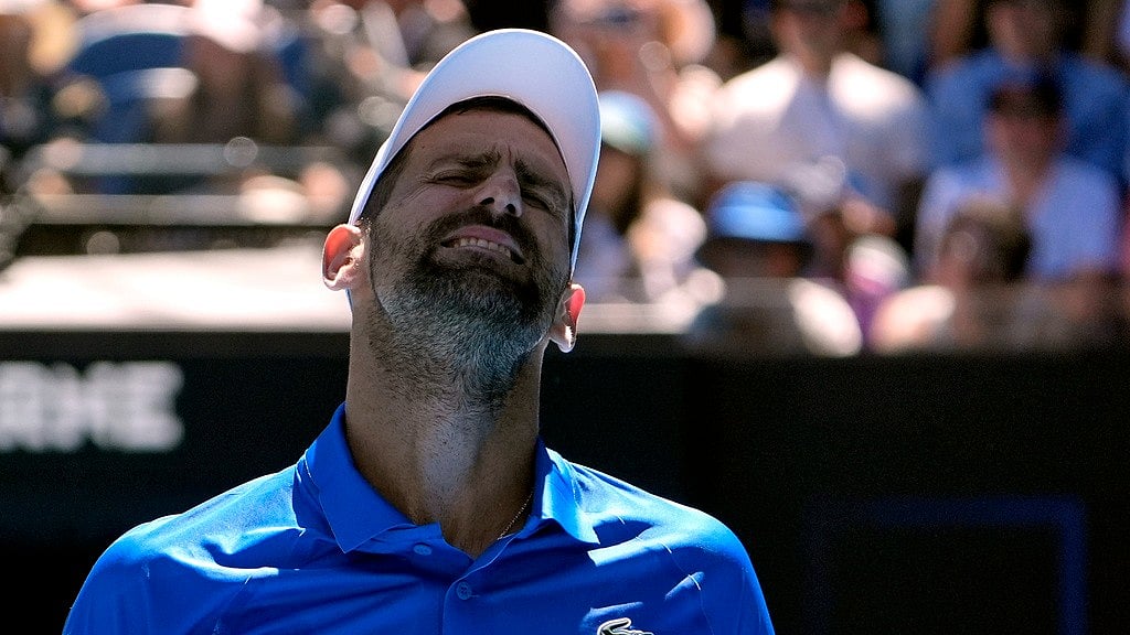 AP/Asanka Brendon Ratnayake : Novak Djokovic of Serbia reacts during his semifinal match against Alexander Zverev of Germany at the Australian Open