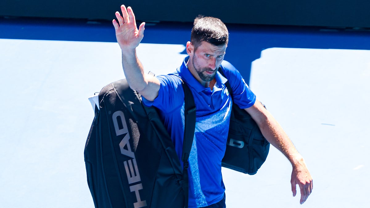 Novak Djokovic acknowledges the crowd after retiring due to injury