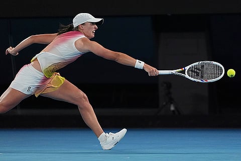 AUS Open 2025 Women's Singles Semi-final: Iga Swiatek plays a backhand return to Madison Keys