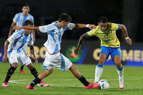 U-20 South American Championship: Argentina's Agustin Chavez and Brazil's Pedro Silva, right, fight for the ball 