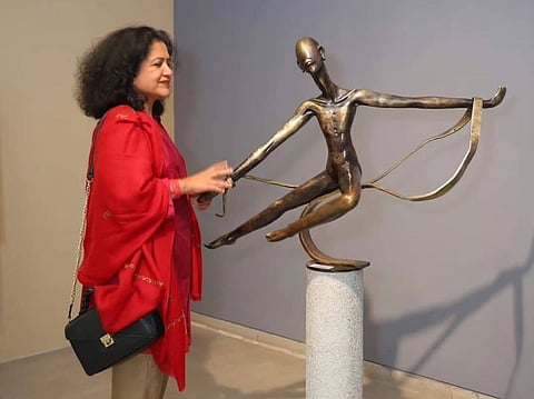 Dimpy Menon with her bronze sculpture