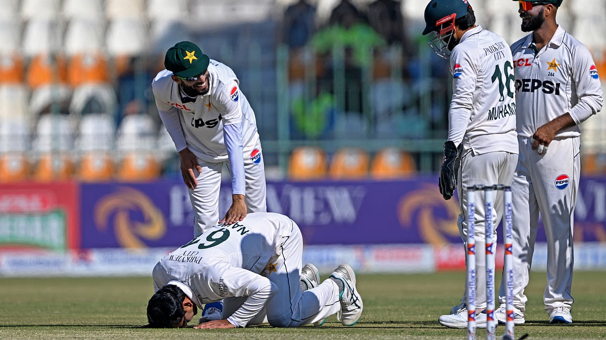 Noman Ali celebrates his fifth wicket on Saturday.