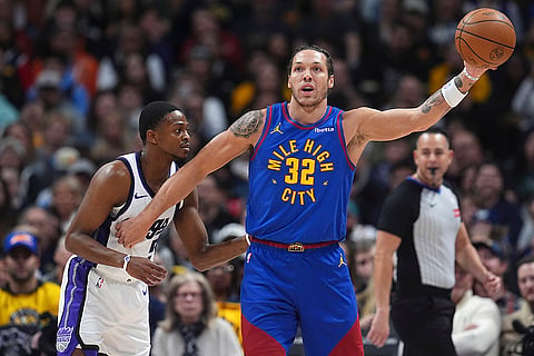 NBA Basketball 2024-25: Nuggets forward Aaron Gordon fields a pass as  Kings De'Aaron Fox defends