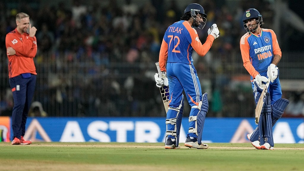 AP : Tilak Varma speaks to batting partner Ravi Bishnoi, right, during the second T20I between India and England.
