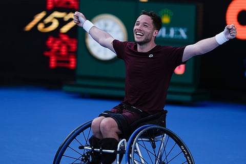 Alfie Hewett of Britain celebrates after defeating Tokito Oda of Japan in the men's wheelchair final at the Australian Open tennis championship in Melbourne, Australia, Saturday, Jan. 25, 2025. 