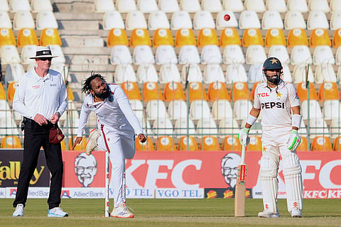 PAK vs WI 2nd Test: West Indies Jomel Warrican, center, bowls