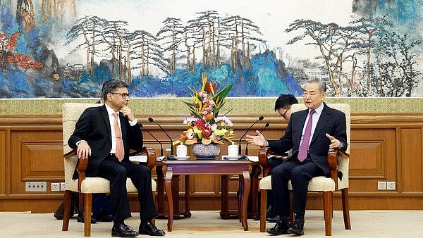 PTI :  In this image posted by @China_Amb_India via X on Jan. 27, 2025, Chinese Foreign Minister Wang Yi and India's Foreign Secretary Vikram Misri during a meeting, in Beijing, Monday, Jan. 27, 2025.