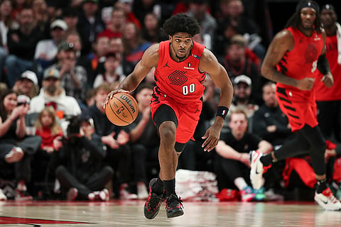 NBA 2024-25: Trail Blazers guard Scoot Henderson (00) brings the ball up court