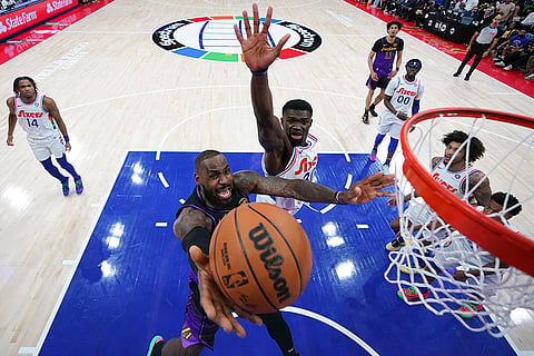 NBA 2024-25: Lakers' LeBron James, bottom goes up for a shot