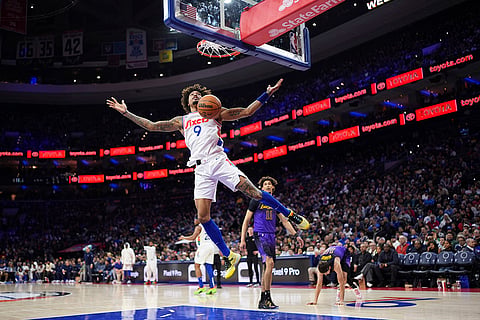 NBA 2024-25: 76ers' Kelly Oubre Jr. reacts after a dunk 