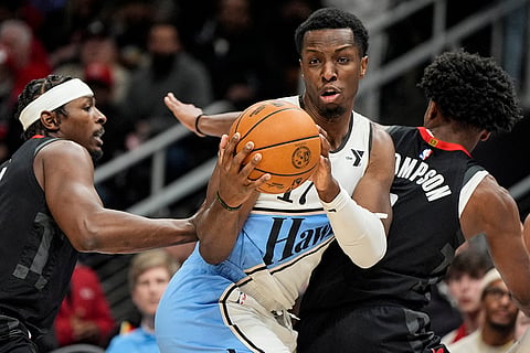 NBA 2024-25: Hawks forward Onyeka Okongwu (17) grabs a rebound