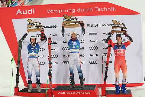 FIS WC 2025: Alexander Steen Olsen, center, poses on podium with second placed Henrik Kristoffersen, left, and third placed Marco Odermatt