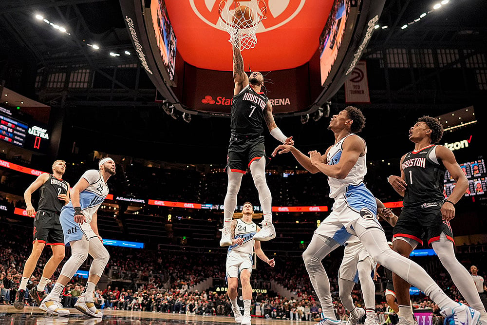 | Photo: AP/Mike Stewart : NBA 2024-25: Rockets forward Cam Whitmore (7) shoots against the Hawks 