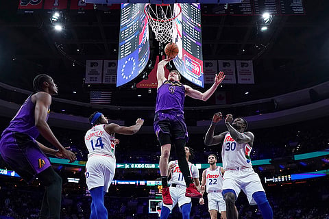 NBA 2024-25: Lakers' Dalton Knecht goes up for a dunk