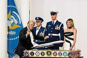 | Photo: AP : Slicing the Past: President Donald Trump holds a sabre in Washington on January 20