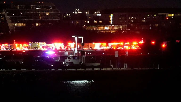 Emergency response teams were responding near Ronald Reagan Washington National Airport on Wednesday - | Photo- Alex Brandon/Associated Press