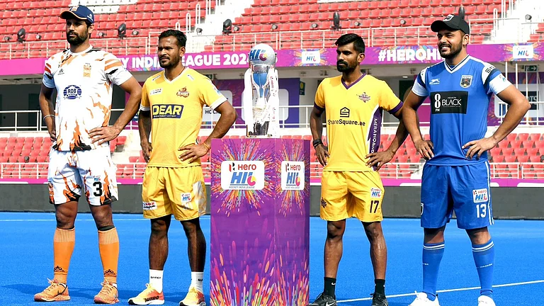 Captains of the four semi-finalists pose ahead of the Hockey India League 2024-25 knockouts. - Hockey India