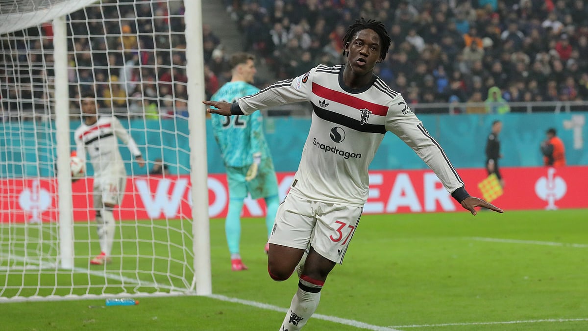 Kobbie Mainoo celebrates for Manchester United - null