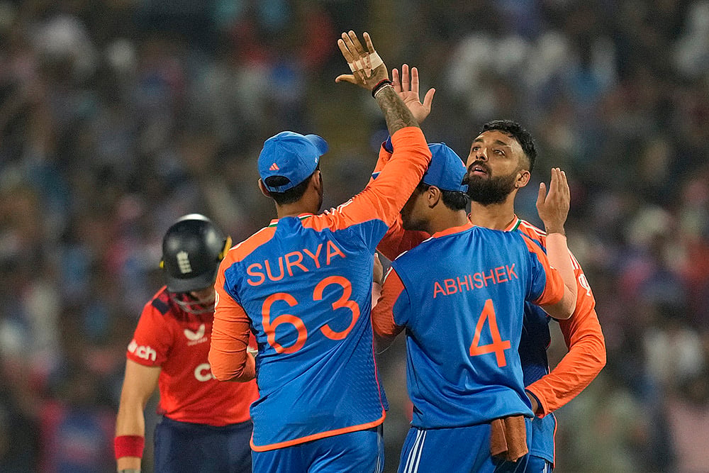India vs England Cricket IND vs AUS 4th T20I pics from Pune: Varun Chakravarthy
