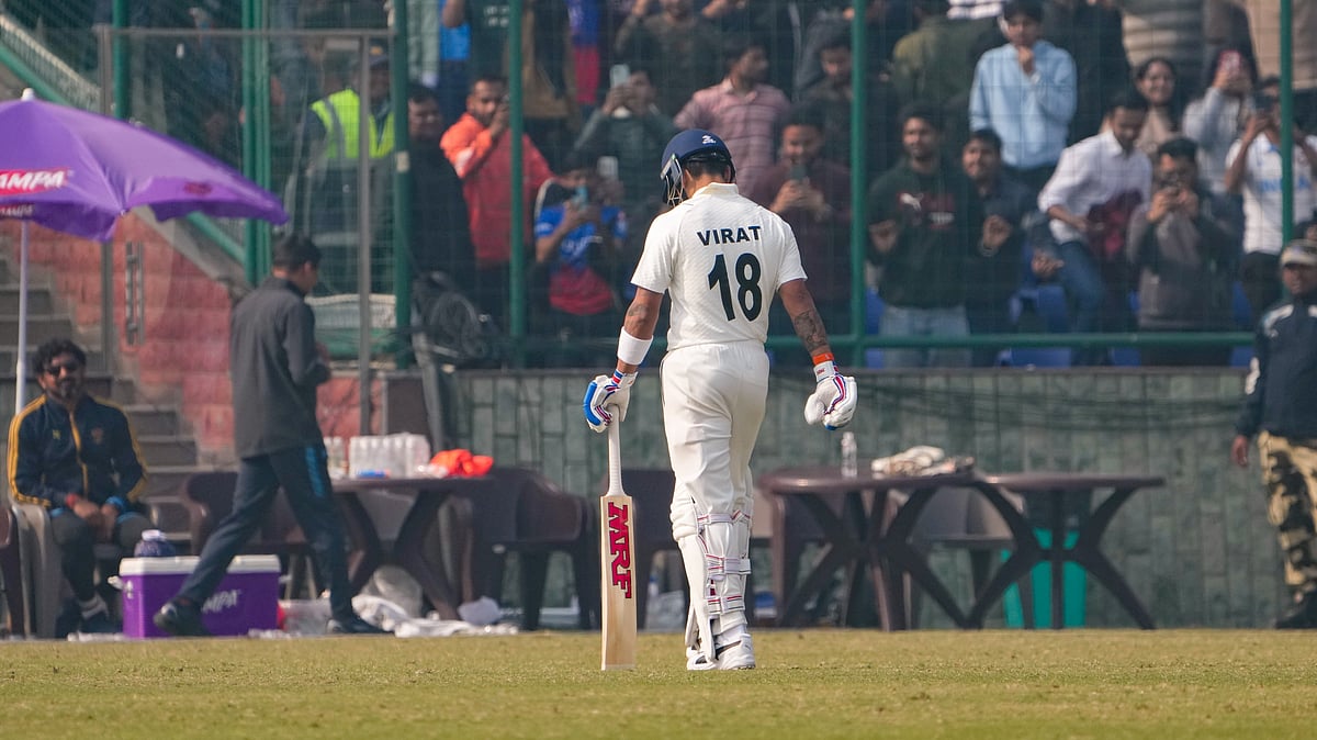 Virat Kohli returns to pavilion after being dismissed by Railways' Himanshu Sangwan on the second day of a Ranji trophy cricket match. - PTI/Atul Yadav