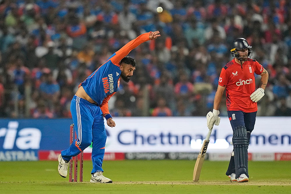 India vs England Cricket IND vs AUS 4th T20I pics from Pune: Varun Chakravarthy