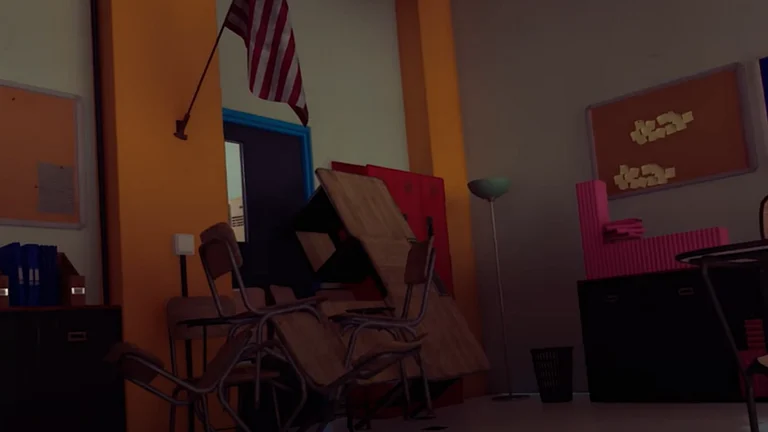 A still from the video game shows desks and chairs stacked up against the door to block the shooter's entry. - | Photo: The Final Exam/Youtube