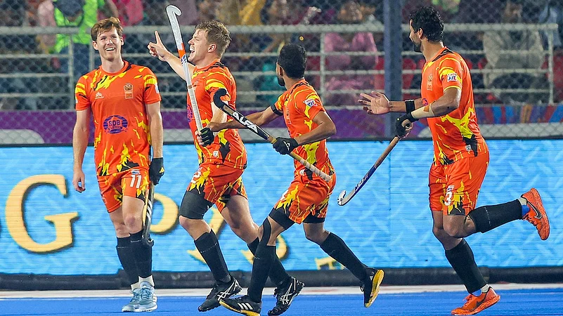 Shrachi Rarh Bengal Tigers celebrate a goal against Hyderabad Toofans.