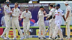 Todd Murphy celebrates a wicket