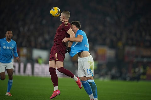 Serie A 2024-25: Napoli's Amir Rrahmani and Roma's Artem Dovbyk challenge for the ball