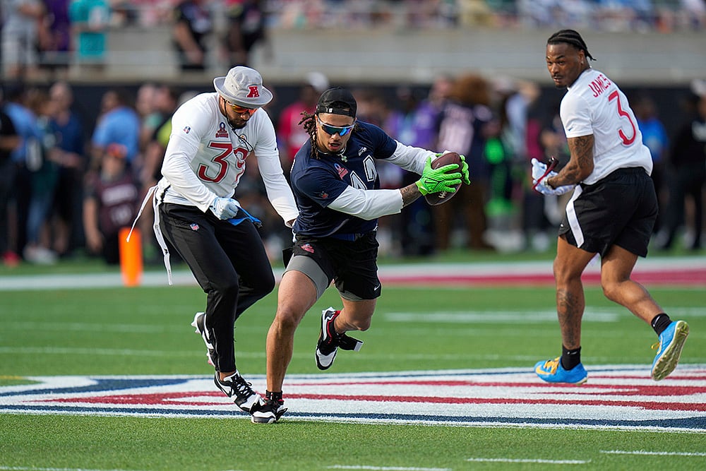 Pro Bowl Football NFC vs AFC game pics: NFC wide receiver Jaxon Smith-Njigba (11)
