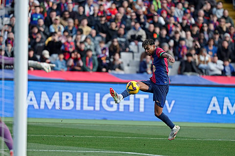La Liga 2024-25: Barcelona's Lamine Yamal prepares to shoot on goal 