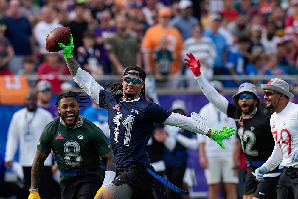 Pro Bowl Football NFC vs AFC game pics: NFC wide receiver Jaxon Smith-Njigba (11)