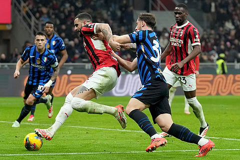 Serie A 2024-25: Inter Milan's Carlos Augusto vies for the ball with AC Milan's Kyle Walker 