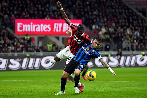 Serie A 2024-25: AC Milan's Tammy Abraham vies for the ball with Inter Milan's Lautaro Martinez