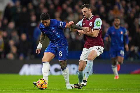 EPL 2024-25: Chelsea's Enzo Fernandez, left, and West Ham's Andy Irving challenge for the ball 