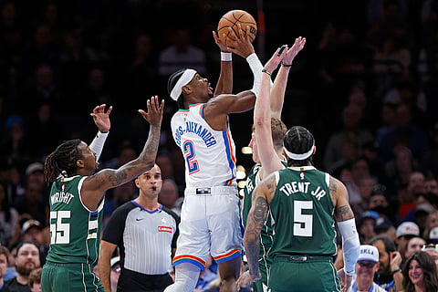 NBA 2024-25: City guard Shai Gilgeous-Alexander (2) looks to shoot 